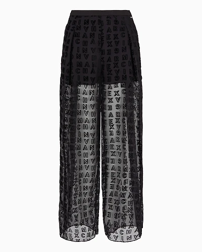 Sheer wide leg trousers with allover logo