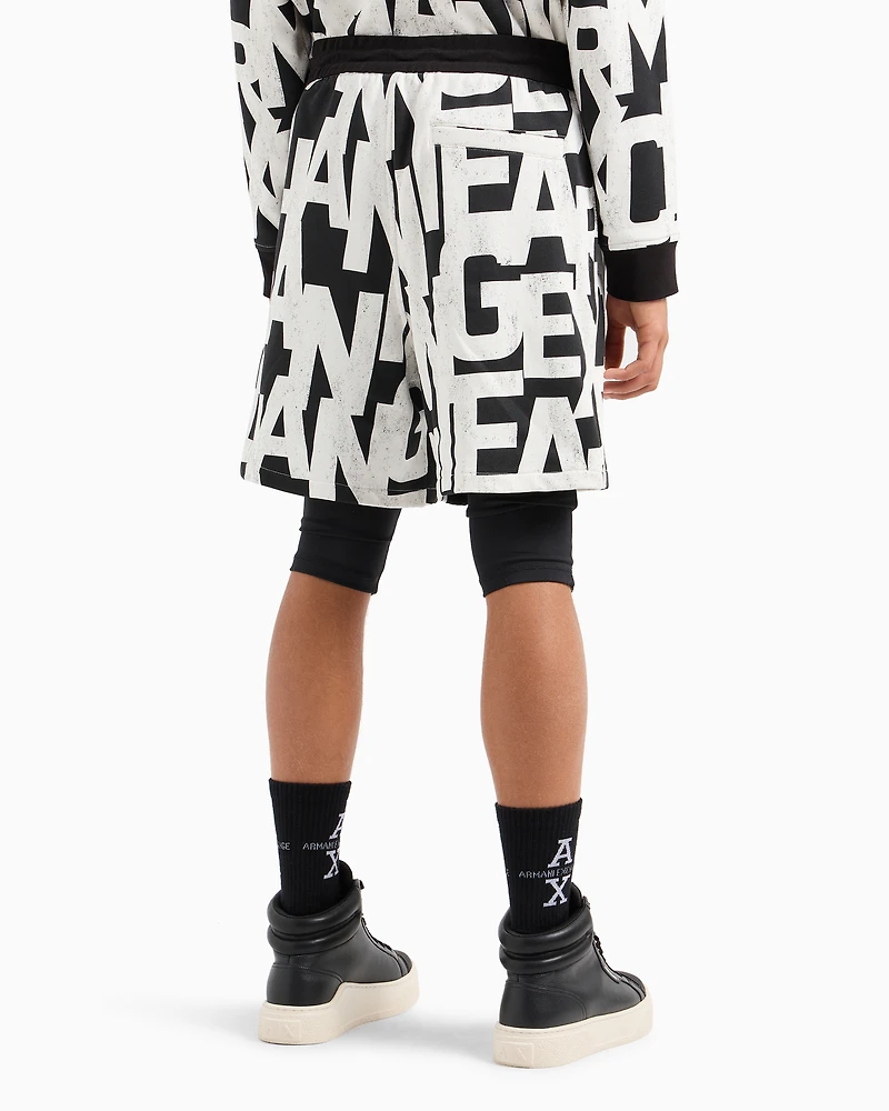 Oversized French terry Bermuda shorts with allover maxi-logo