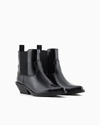 Camperos boots with elastic inserts