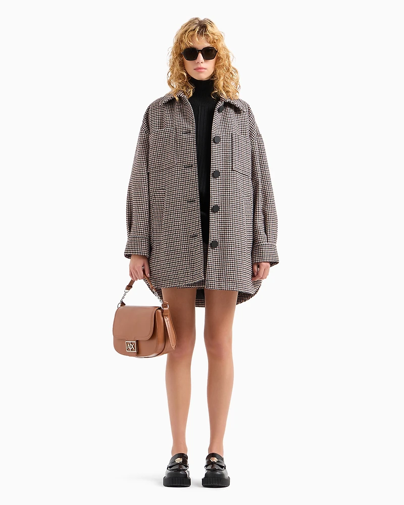 Asymmetrical high neck knitted sweater