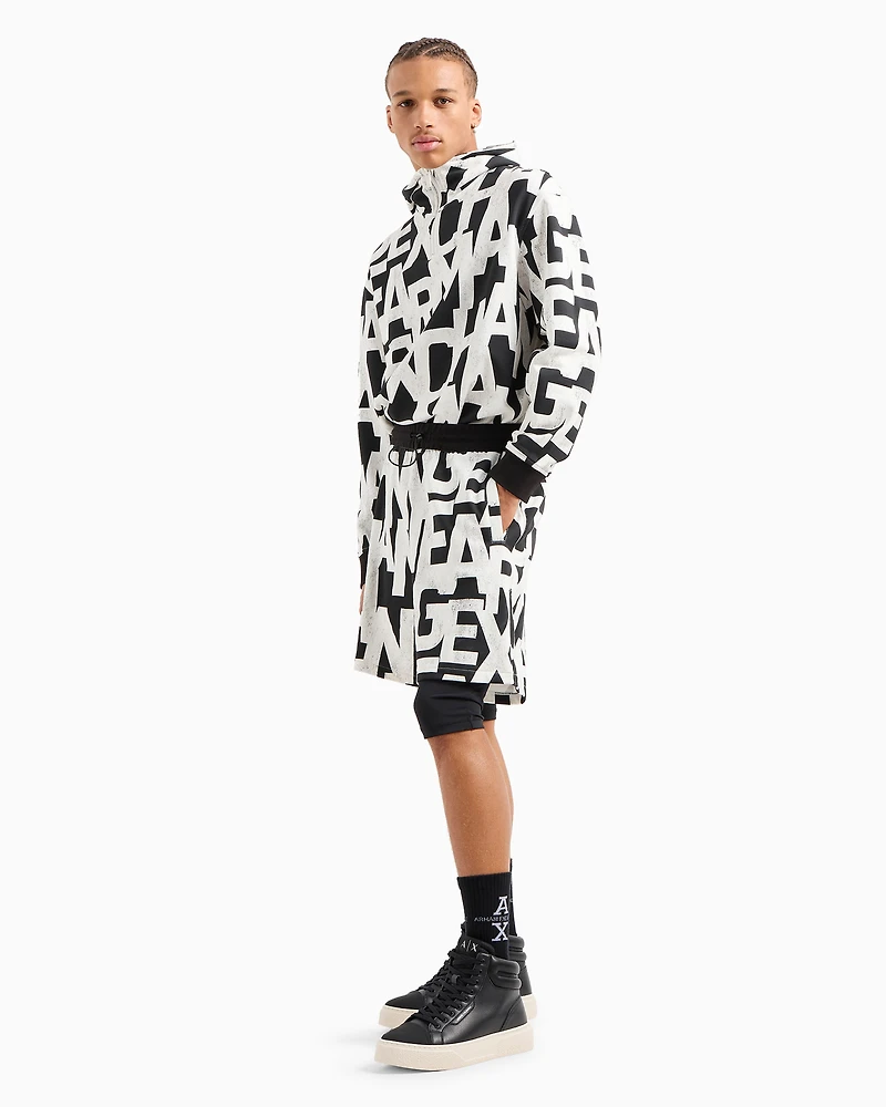 Oversized French terry Bermuda shorts with allover maxi-logo