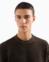 Crewneck sweater with embossed workmanship