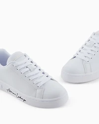 Sneakers with signature logo on the sole