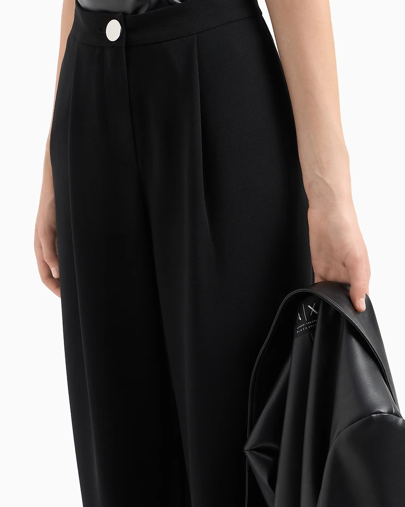 Pleated trousers flowing fabric