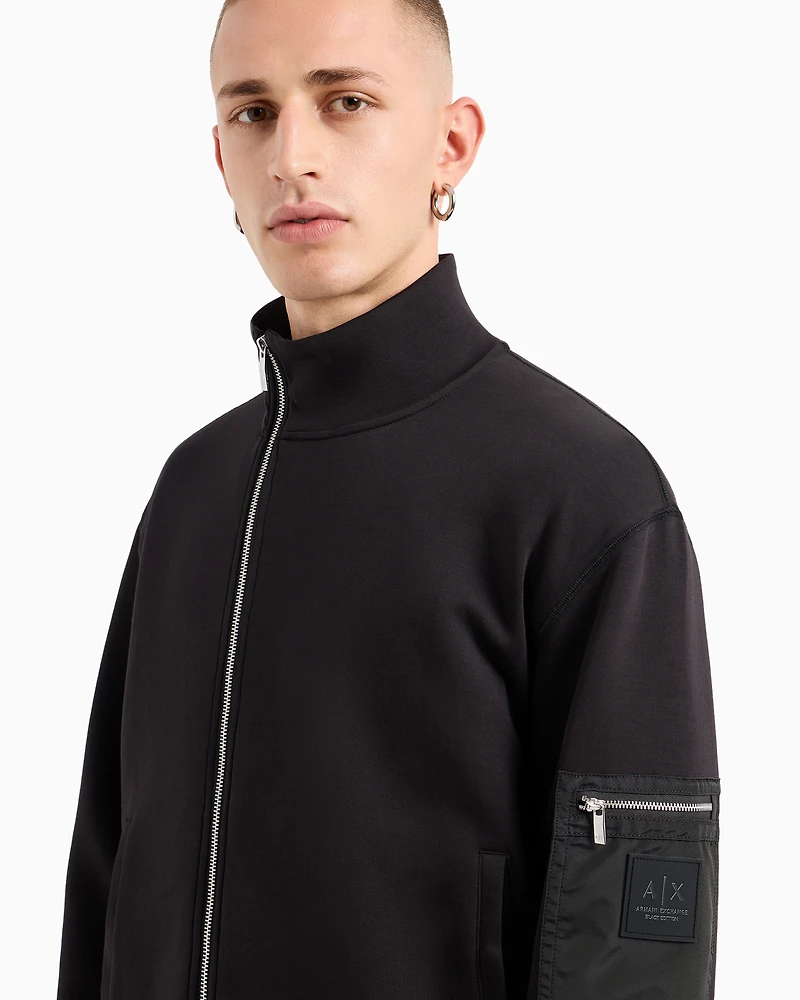 Sweatshirt with side zip pocket on sleeve