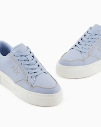 Sneakers with rope piping
