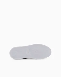 Sneakers with signature logo on the sole