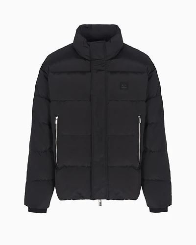 Padded and quilted jacket with high collar
