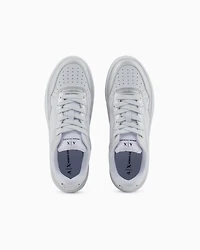 Sneakers with metallic inserts