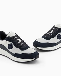 Mesh sneakers with rubber logo