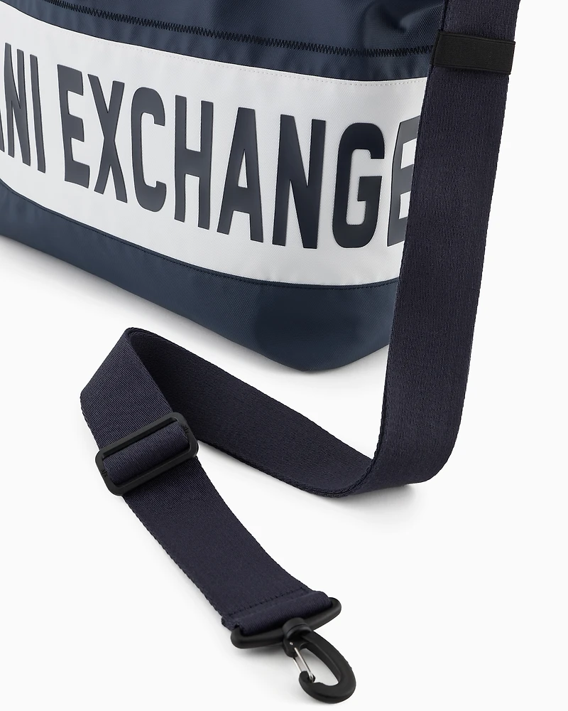 Duffel bag with maxi-logo and shoulder strap