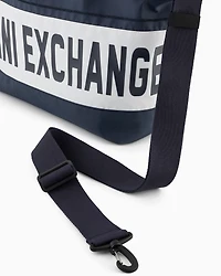 Duffel bag with maxi-logo and shoulder strap
