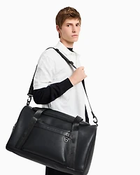 Duffel bag in resistant coated material with two handles