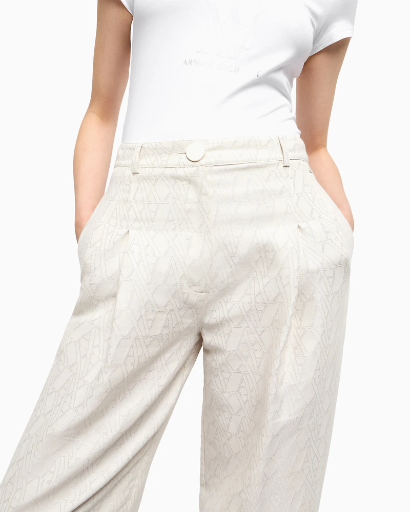 Pleated trousers with allover logo