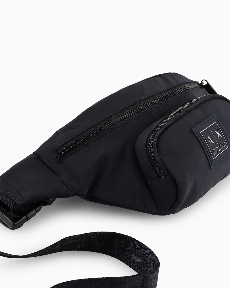 Waist bag with external pocket