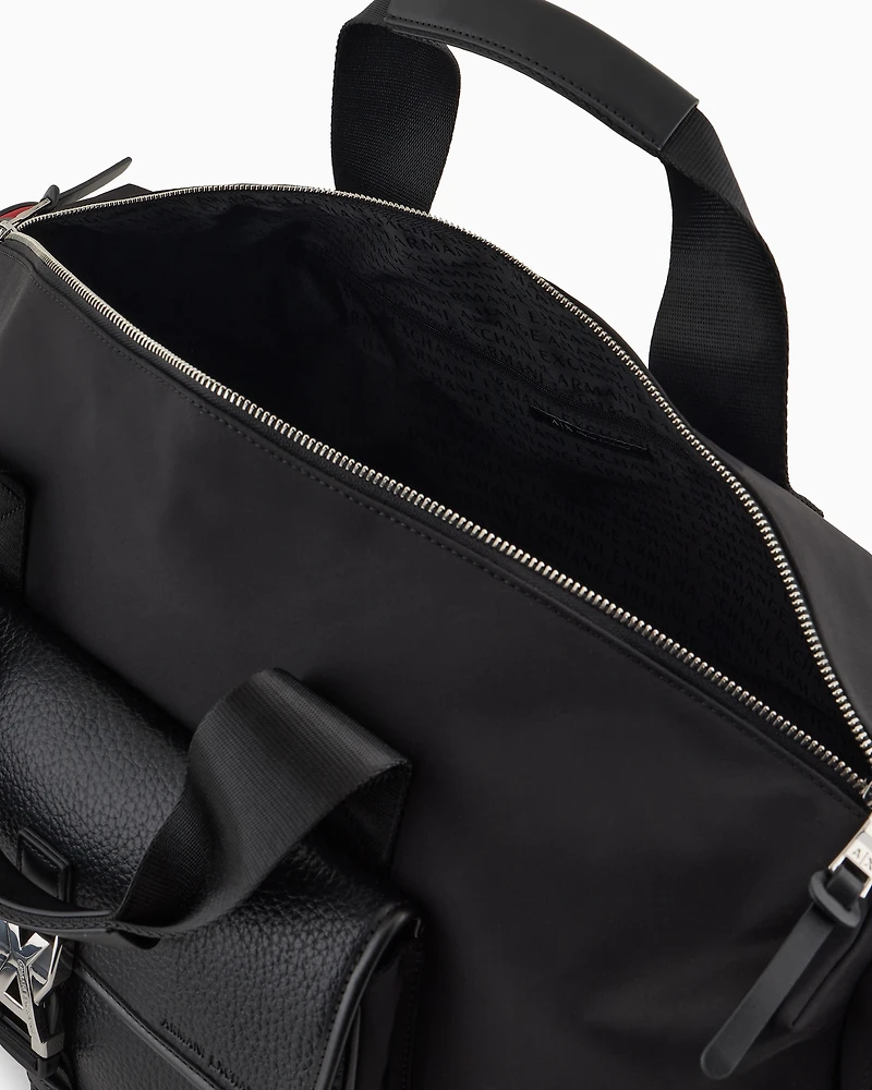 Duffel bag with external pockets