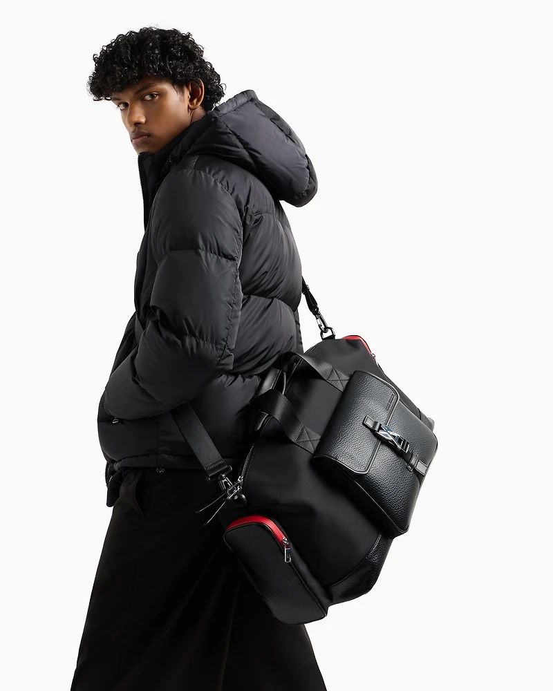 Duffel bag with external pockets