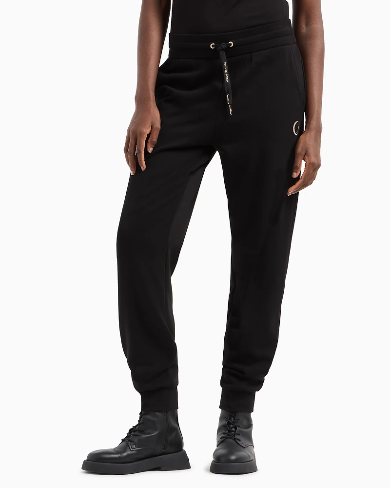 Jogger pants with metal logo