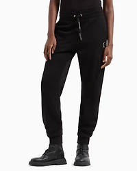 Jogger pants with metal logo