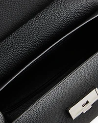 Handbag with metal details