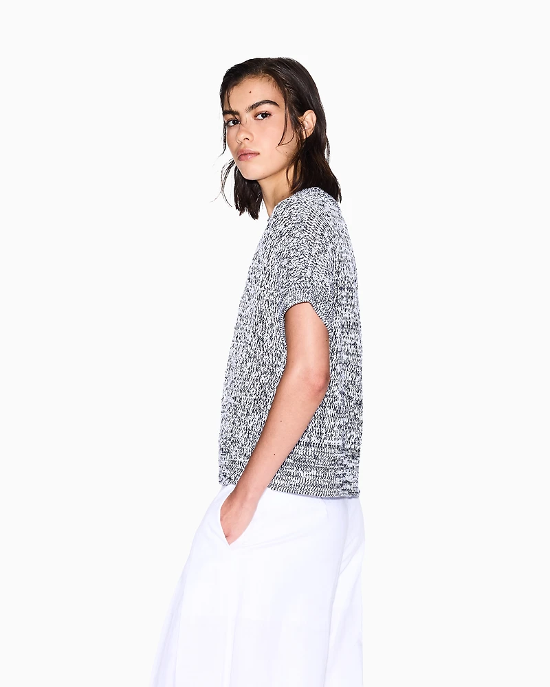 Perforated bouclé fabric sweater