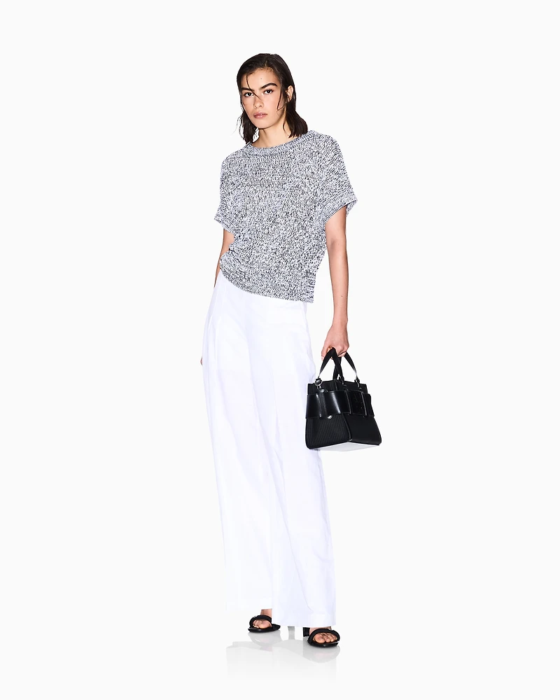 Perforated bouclé fabric sweater