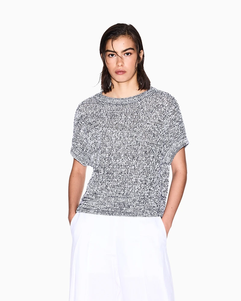 Perforated bouclé fabric sweater
