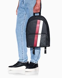 Backpack with monogram and stripes