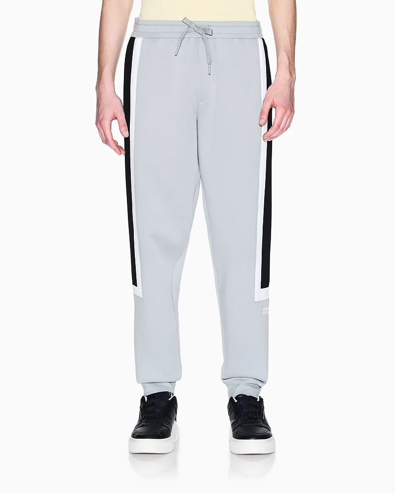 Jogger pants with contrasting stripes
