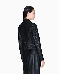 Leather jacket with quilted sleeves