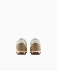 Sneakers with allover logo inserts