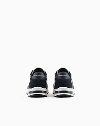 Mesh sneakers with rubber logo