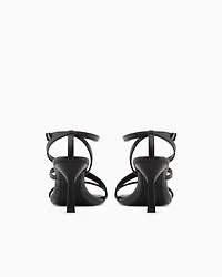 Heeled sandals with straps
