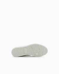 Sneakers with allover logo inserts