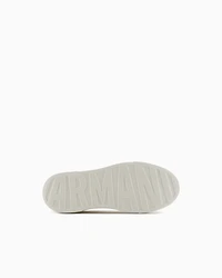 Sneakers with contrasting logo