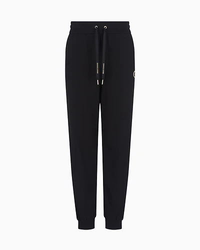 Jogger pants with metal logo