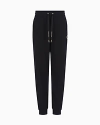Jogger pants with metal logo