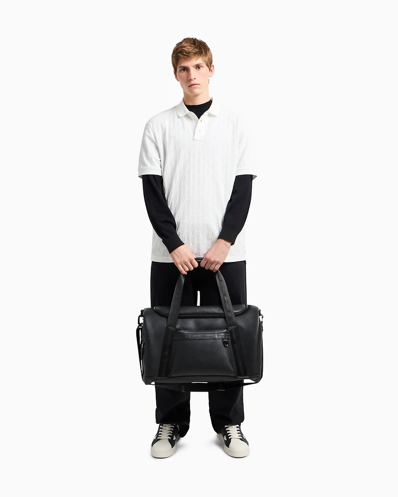 Duffel bag in resistant coated material with two handles