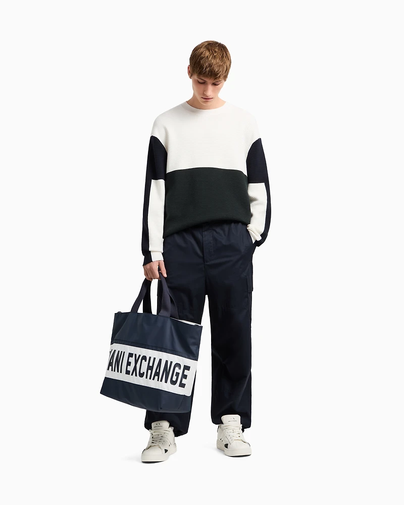 Duffel bag with maxi-logo and shoulder strap