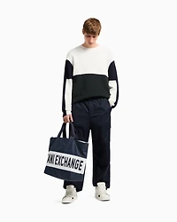 Duffel bag with maxi-logo and shoulder strap