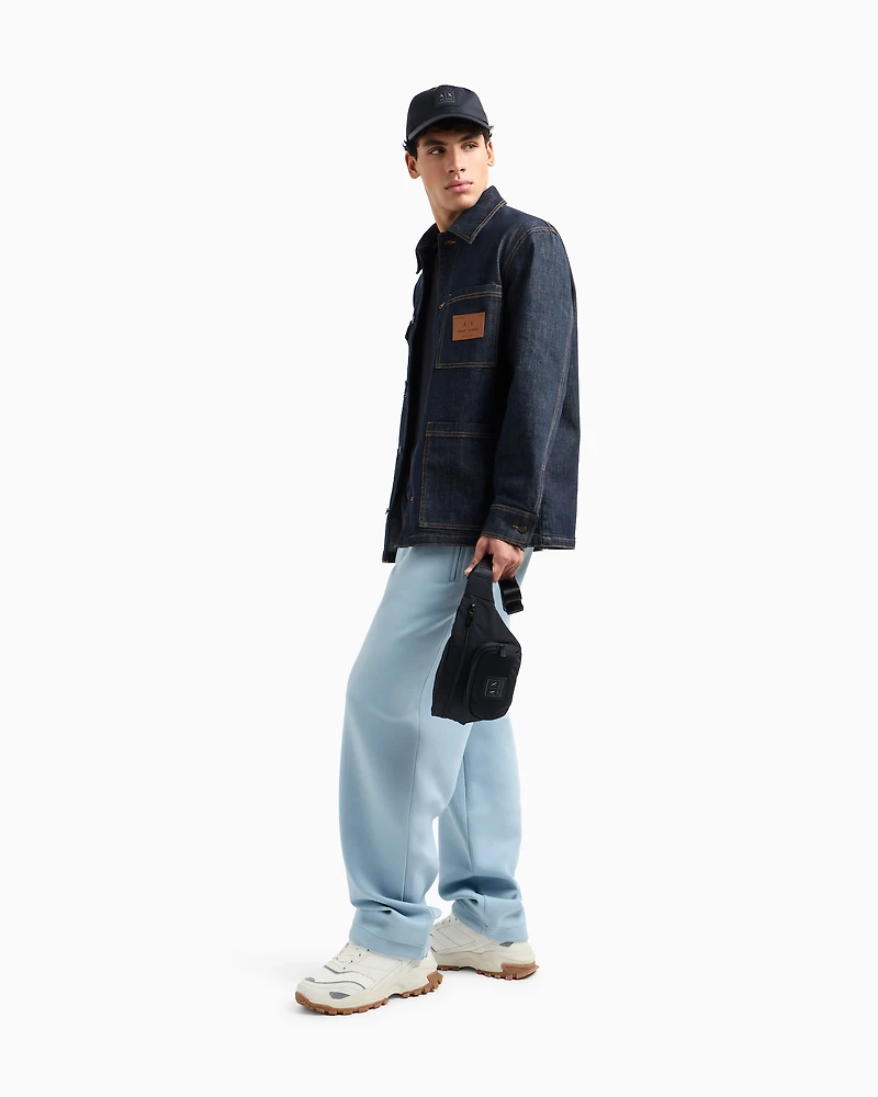 Waist bag with external pocket