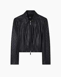 Leather jacket with quilted sleeves