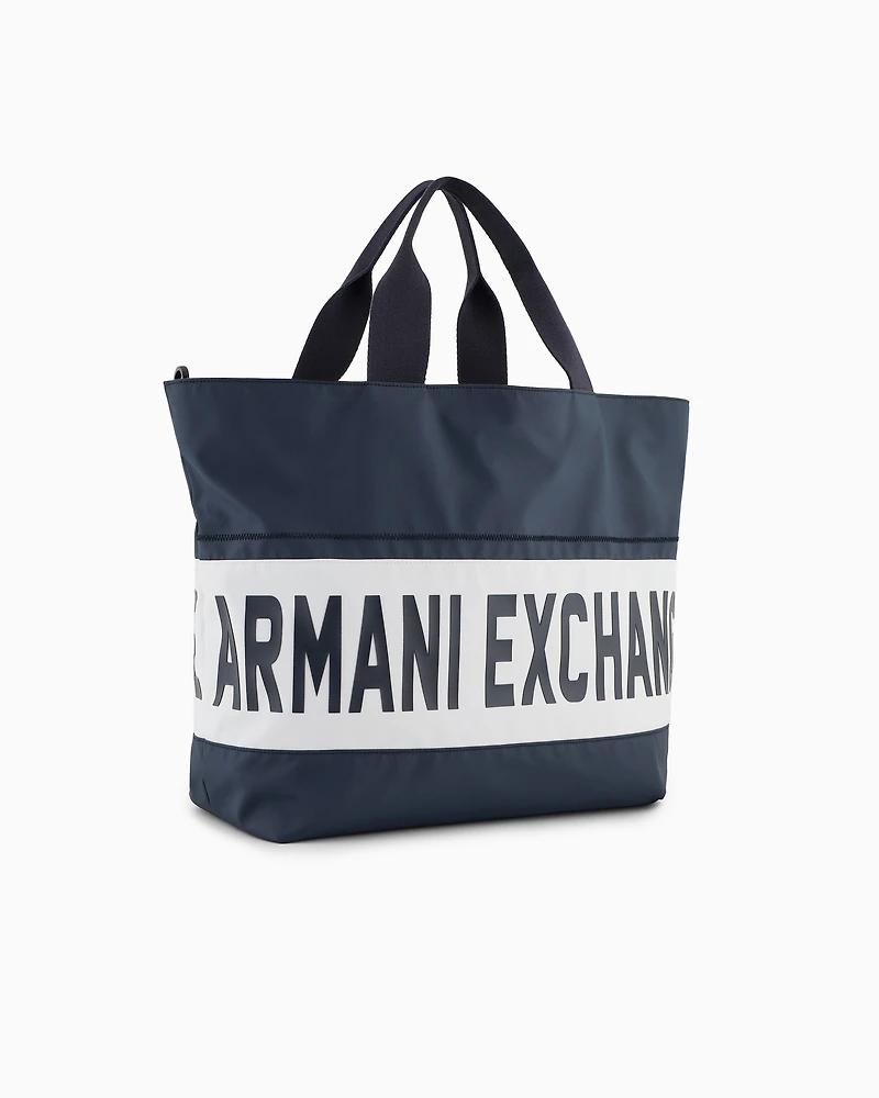 Duffel bag with maxi-logo and shoulder strap