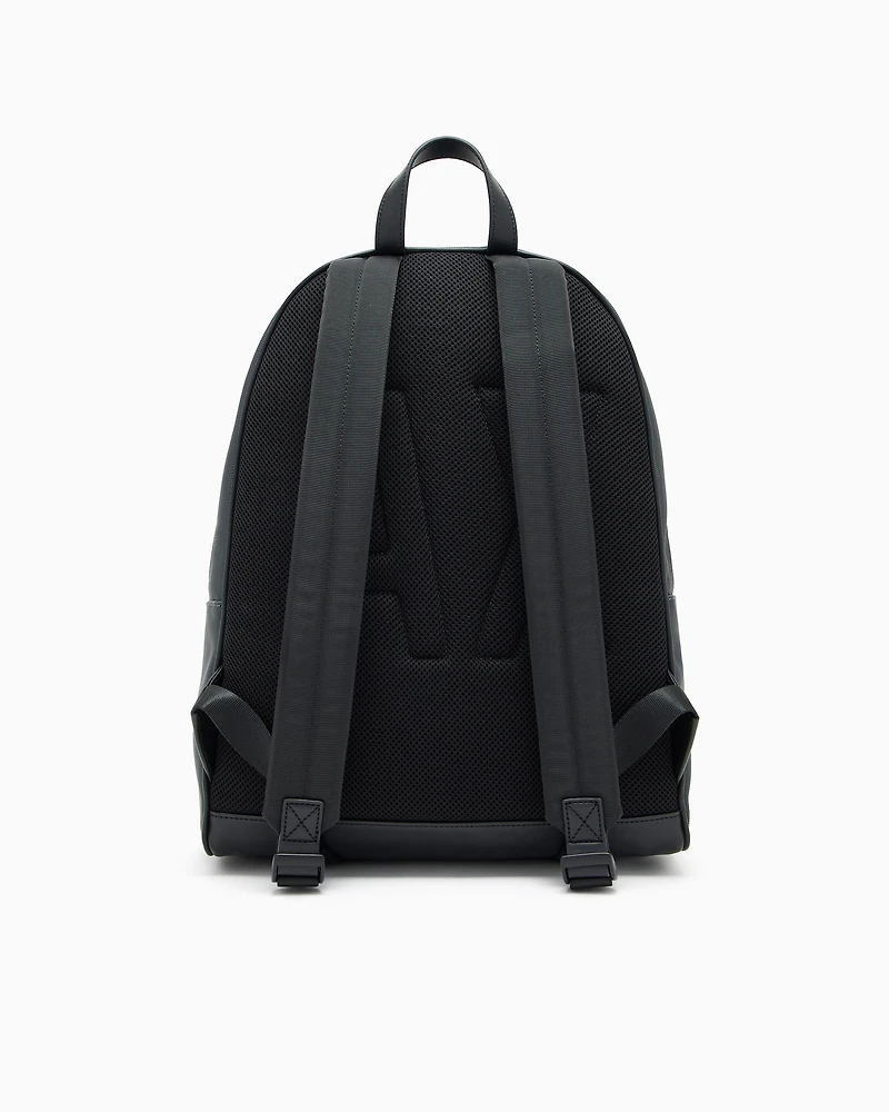 Backpack with monogram and stripes