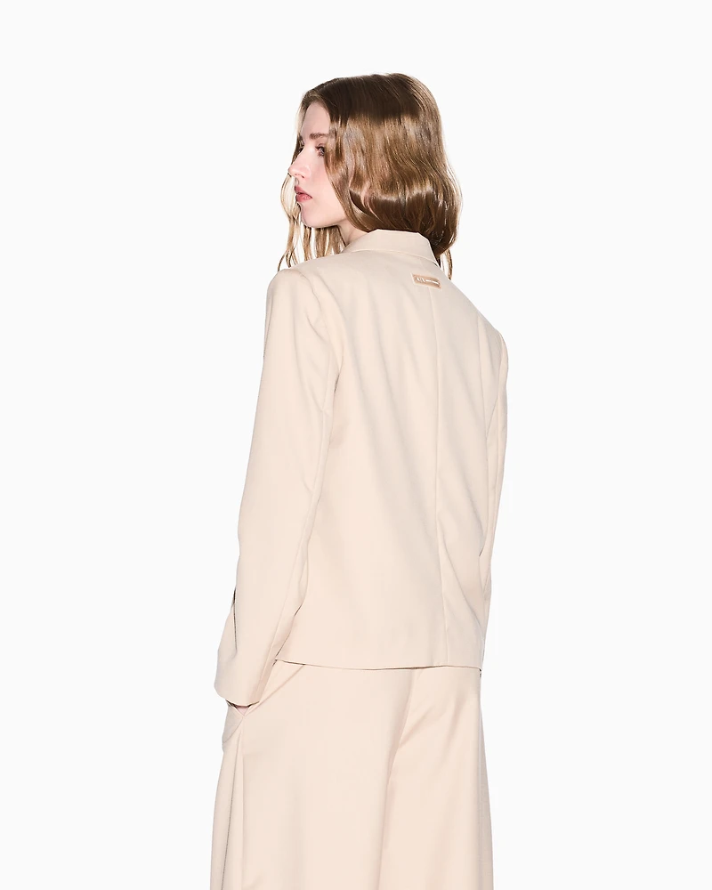 Jacket with off-center buttons