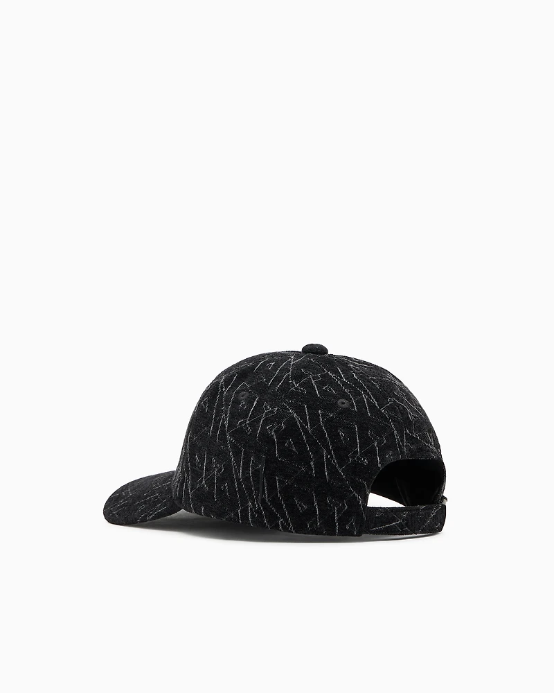 Visor cap with embroidered logo