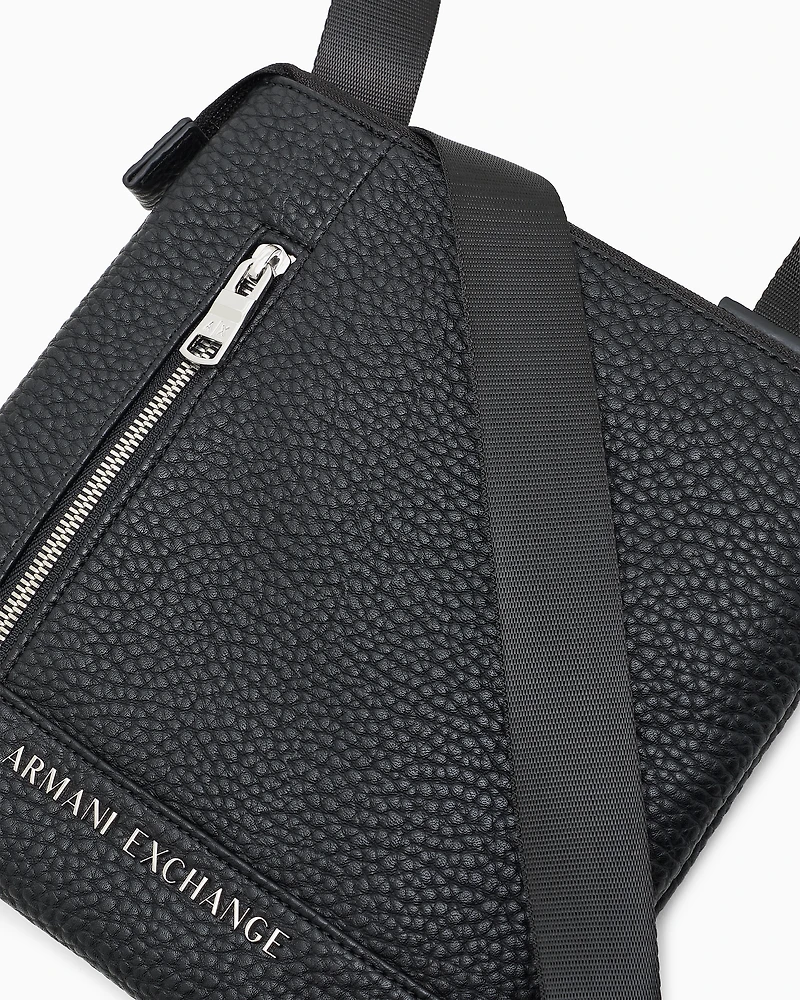 Flat crossbody bag with external pocket
