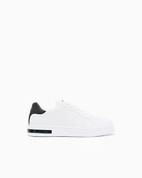 Lace-up sneakers with allover embossed logo
