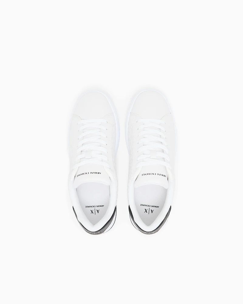 Lace-up sneakers with allover embossed logo