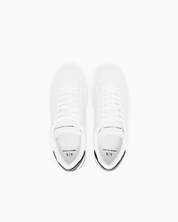 Lace-up sneakers with allover embossed logo